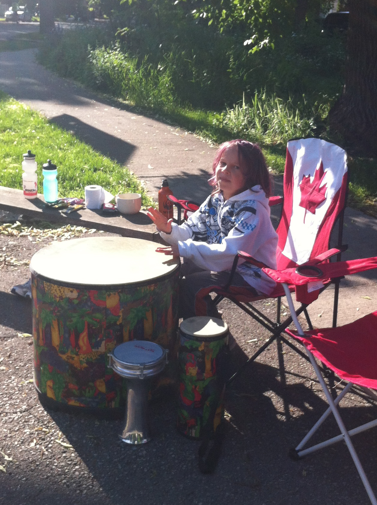 Manitoba Marathon had many cheerers and encouragers, including this young woman who drummer for runners as they passed by